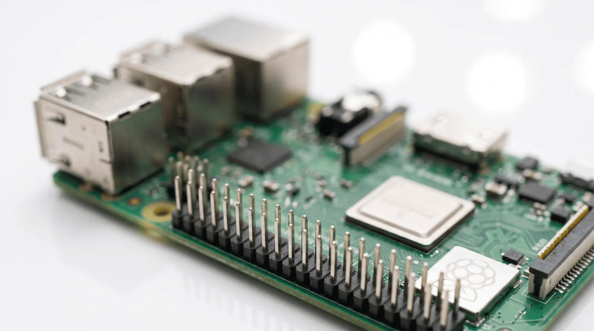 Single-board computer with header pins and connector ports
